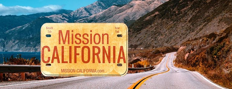 Mission California license plate with mountains and highway