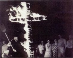 Shine of the Little Flower Catholic Church cross burning