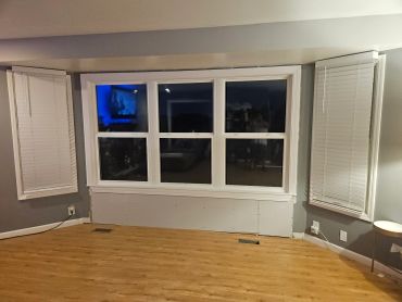 New Window with blinds and wooden floor indoors. By JTAL Home