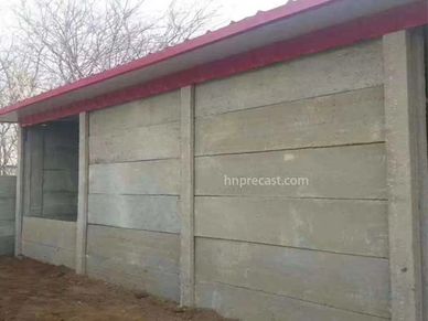 Concrete simpe house with wall panels