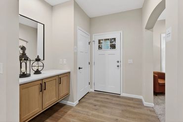 Walk-in pantry with ample shelving and storage space
