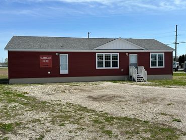 Spacious manufactured home placed on a cleared Indiana property by Fahl Homes.