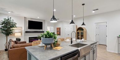 Spacious open-concept living area showcasing premium finishes and natural light