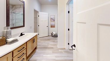 Showroom photo highlighting popular fahl homes reviews floorplan.