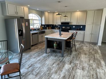 Affordable mobile home by Fahl Homes with driveway, septic, and utilities completed.