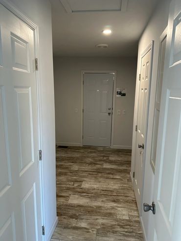 Happy homeowner testimonial in front of a Fahl Homes modular build.