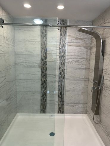 Happy family in front of their Fahl Homes modular home, site work done in-house.