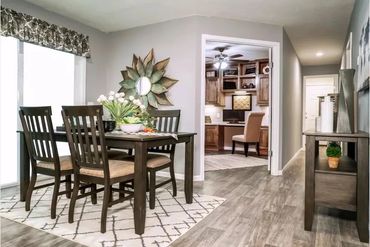 Inside look at modern manufactured home – spacious kitchen and open living area