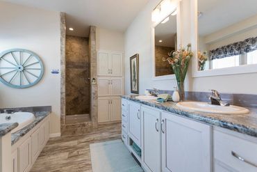 Mobile home park installation featuring multiple homes set in a row.