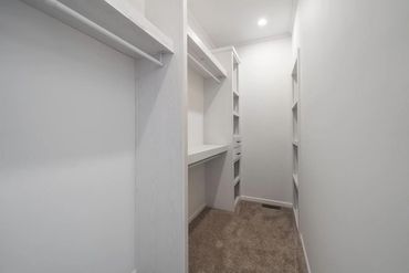 Level doublewide home with complete electric hookup by Fahl Homes.