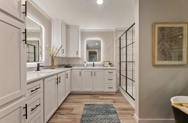 New mobile home delivery and setup in a quiet Indiana park.