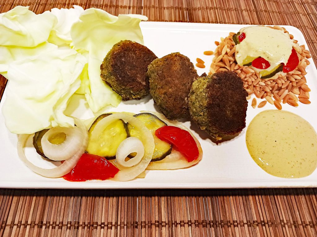 Falafel plate with red lentil rice