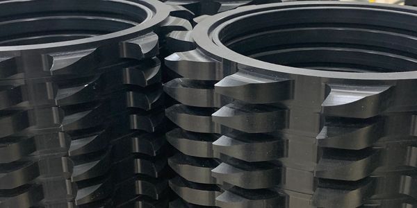 UHMW parts CNC cut in plastic fabrication shop