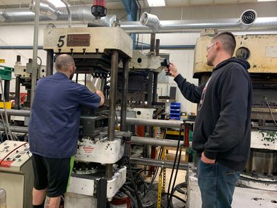 Millennial farmer molding plastic parts