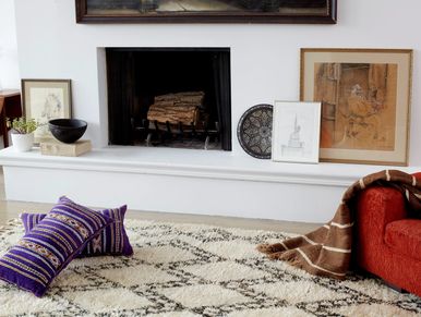Moroccan Beni Ourain Rug, Berber Pillows & Striped Throw with Ornate Moroccan Accessories. 