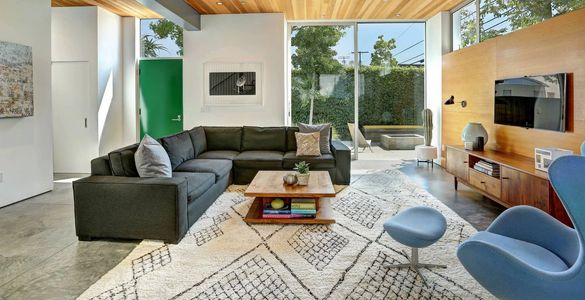 Custom-made hand-loomed Moroccan Beni Ourain wool rug with harlequin pattern and diamond lozenge.