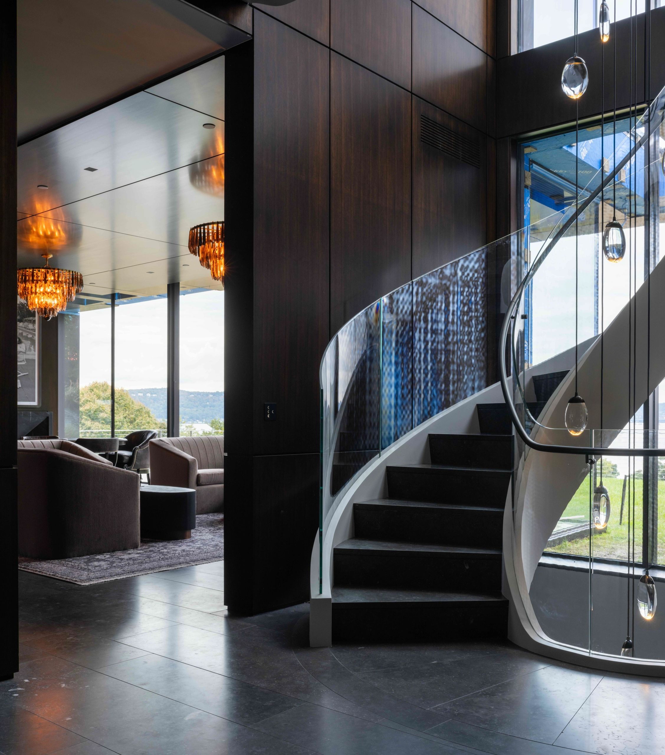 Onandaga bluestone seamlessly continues on both interior and exterior living spaces.