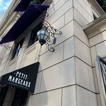 Bedford Grey Limestone custom-cut Signature Panels with custom-cut surrounds and other architectural