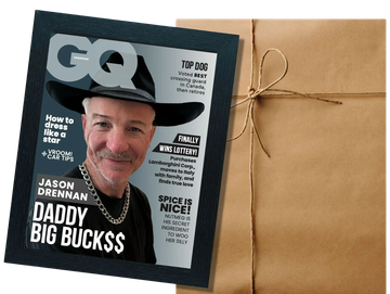 Framed GQ magazine cover featuring Jason Drennan with a cowboy hat and chain necklace.