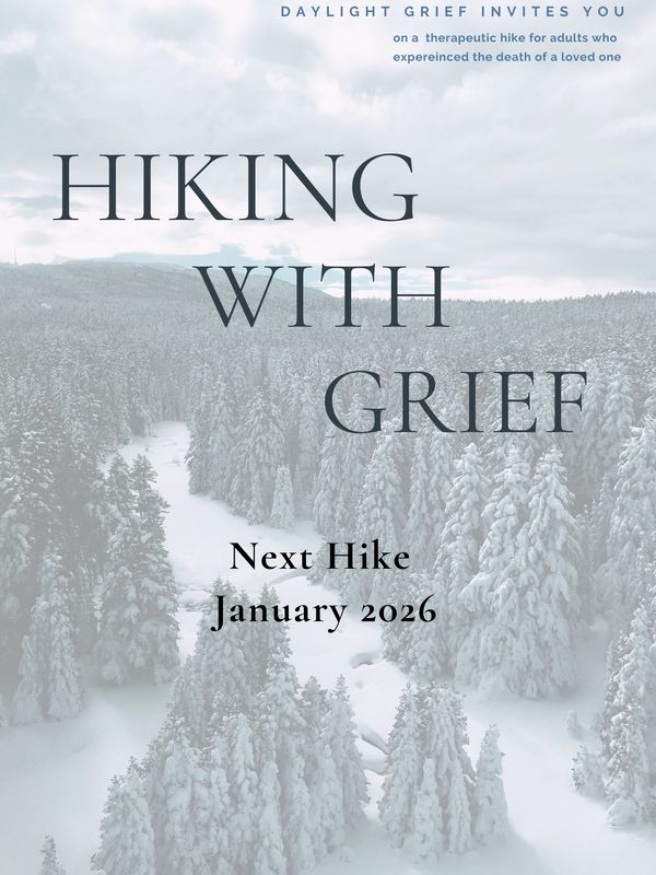 Snow-covered forest promoting a therapeutic hiking event for grief support in January 2026.