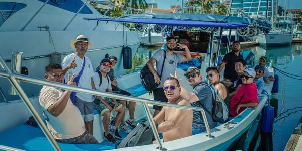 Boat ride to snorkeling lessons from a dock near Naval base in Puerto Vallarta