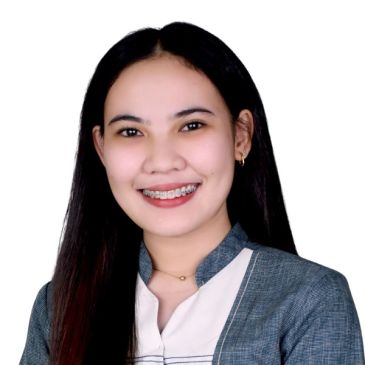 Young woman smiling with braces.