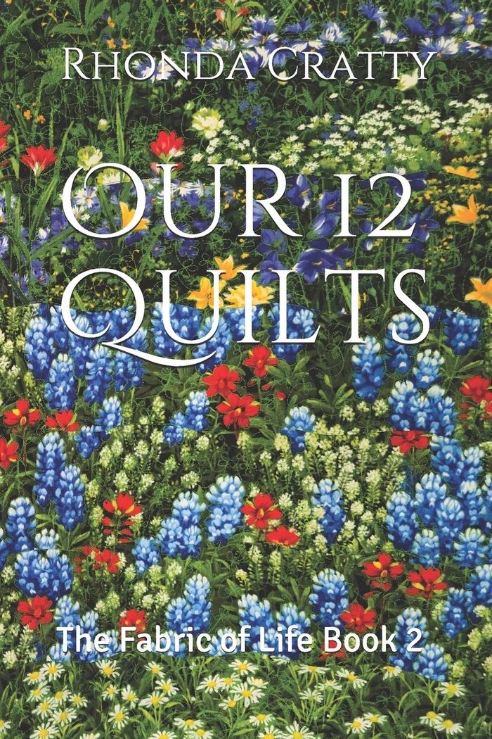 Introducing:
Our 12 Quilts
The Fabric of Life Book 2