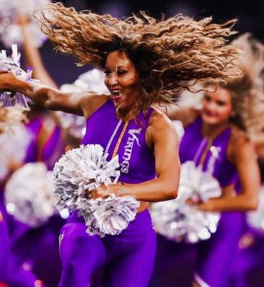 NFL Cheerleader rocking Kurt's work.