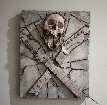 Heavy Rock fossil skull and guitar cross bones. LED lighting and custom irregular edge.