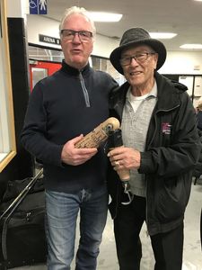 Bob Tessier and Buddy Noon holding the Mr Hook Award.