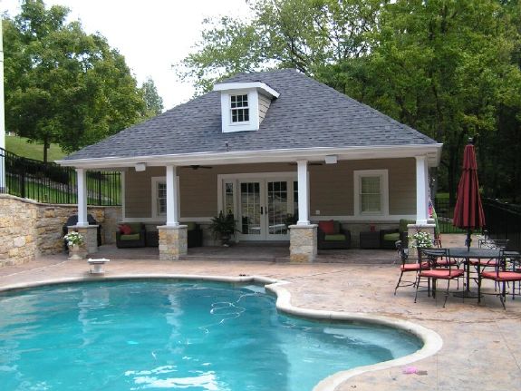 Pool house and outdoor fireplace in Chesterfield, MO