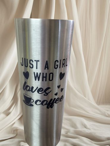 Stainless steel cup with the phrase 'Just a girl who loves coffee'.