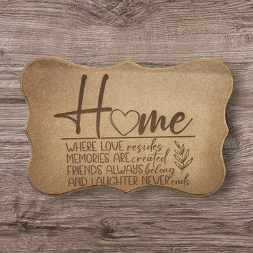 Wooden plaque with a heartfelt home quote and heart design.