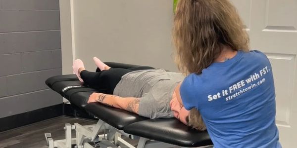Fascial Stretch Therapy (FST) by physiotherapy assistant at Rx Physio Health Whitby