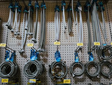 Group of plumbing products on the shelf for sale