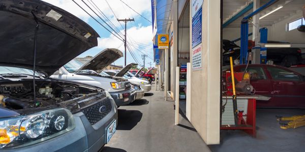 Exterior of Furgerson's Garage with cars in progress