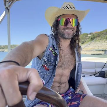 Experienced boat captain with Jeramy’s Party Boat Rentals ensuring a fun day on Lake Austin