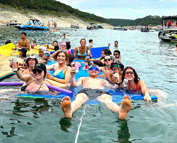 Friends, fun and waves on Lake Travis with Jeramy’s party boat rentals.