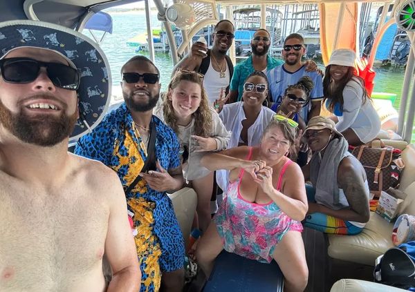 Captain Pacey is the life of the party with her guests on lake travis
