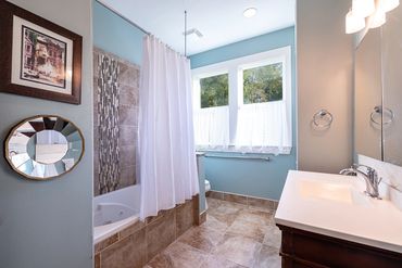 Bathroom with double windows and trim