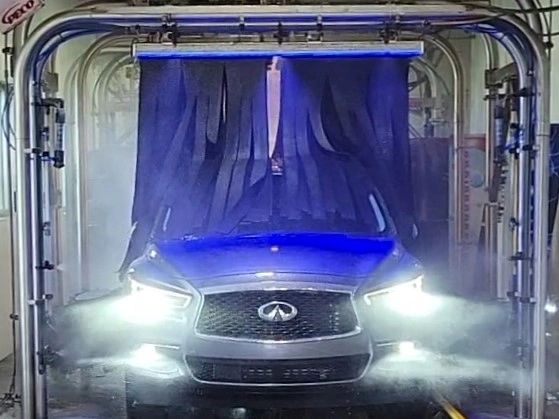 Car being washed at Mr. t's Auto Wash in Rochester Hills Michigan.