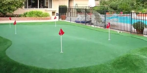 Elevate your golf game with our custom-built putting greens that can transform your backyard into a 