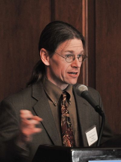 Thor Hanson delivers a presentation at an event at the American Museum of Natural History