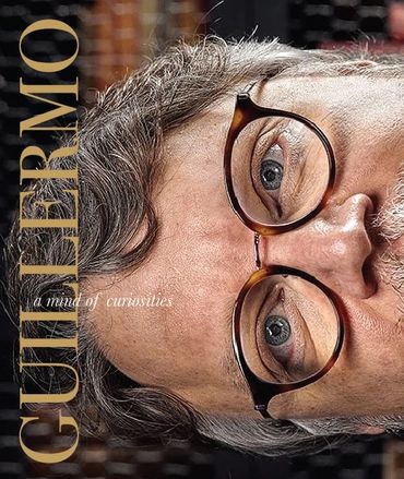 A book cover for the "GUILLERMO" Lecture series booklet. His name is in bold yellow over his image