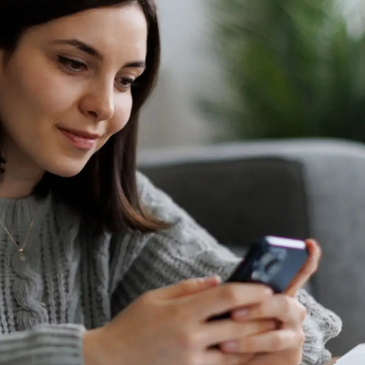 girl on phone paying counselor