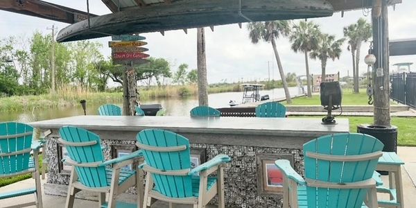 Relaxation awaits at our waterfront Gazebo. Chill and watch an LSU game on the bayou.