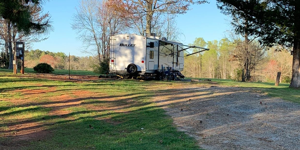 RV Camper campground ready for your time to relax on a working hayfield farm. 