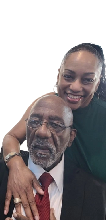 A smiling woman embraces a serious older man in formal attire.
