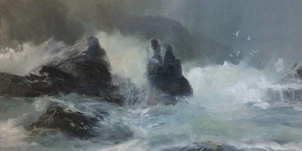 Stormy sea crashing against dark rocky cliffs under a gray sky.