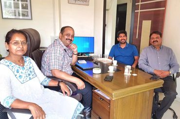 Dr Sandhya Salway & Rajesh Salway with clients